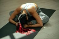 The Bandha Konasana is a good preparatory pose for Hanumanasana (Image from Pexels @Miriam Alonso)